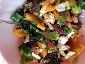 kale salad with chicken and orange tomatoes