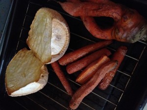 Roasted rutabaga and carrots in oven.